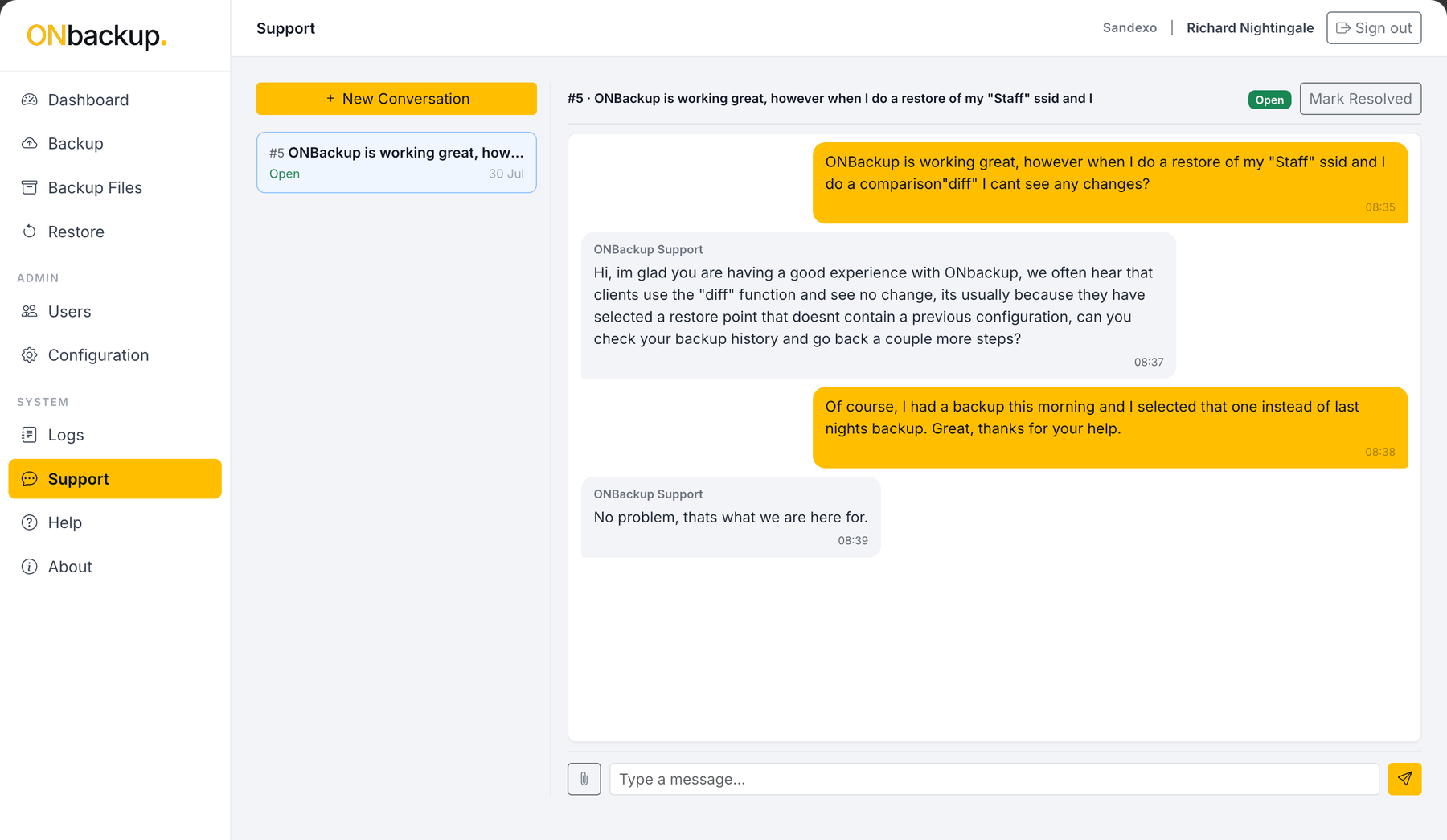 The ONbackup Support conversation view, showing a threaded chat between a customer and ONbackup Support with an Open status and a message box to reply.